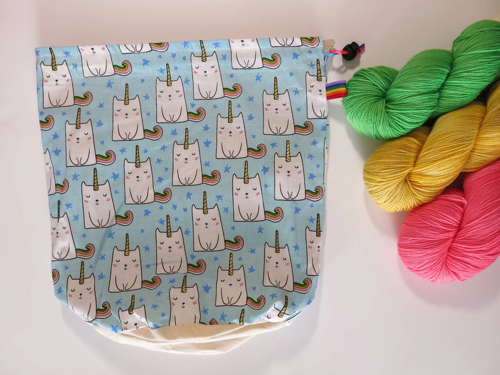 hand sewn cotton project bag with rainbow caticorns