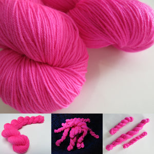 neon uv reactive pink sock yarn for festival and black light knits