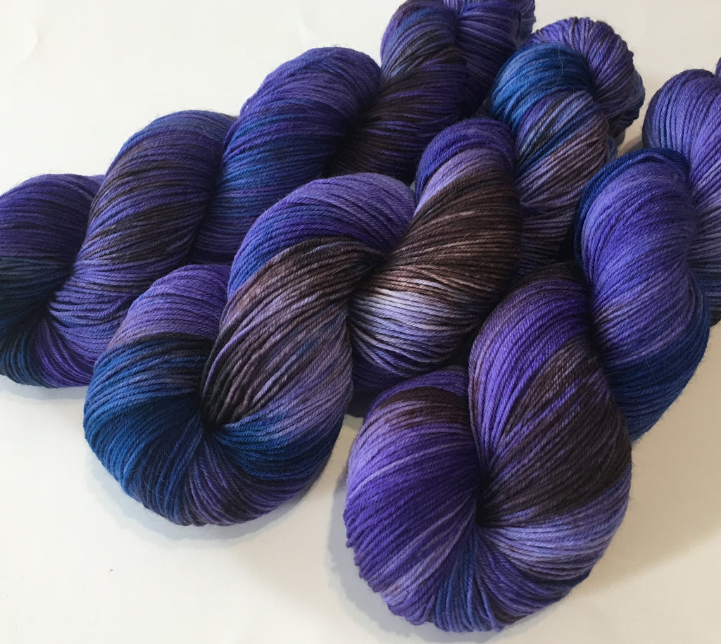 kettle dyed purple and blur superwash merino sock yarn skeins