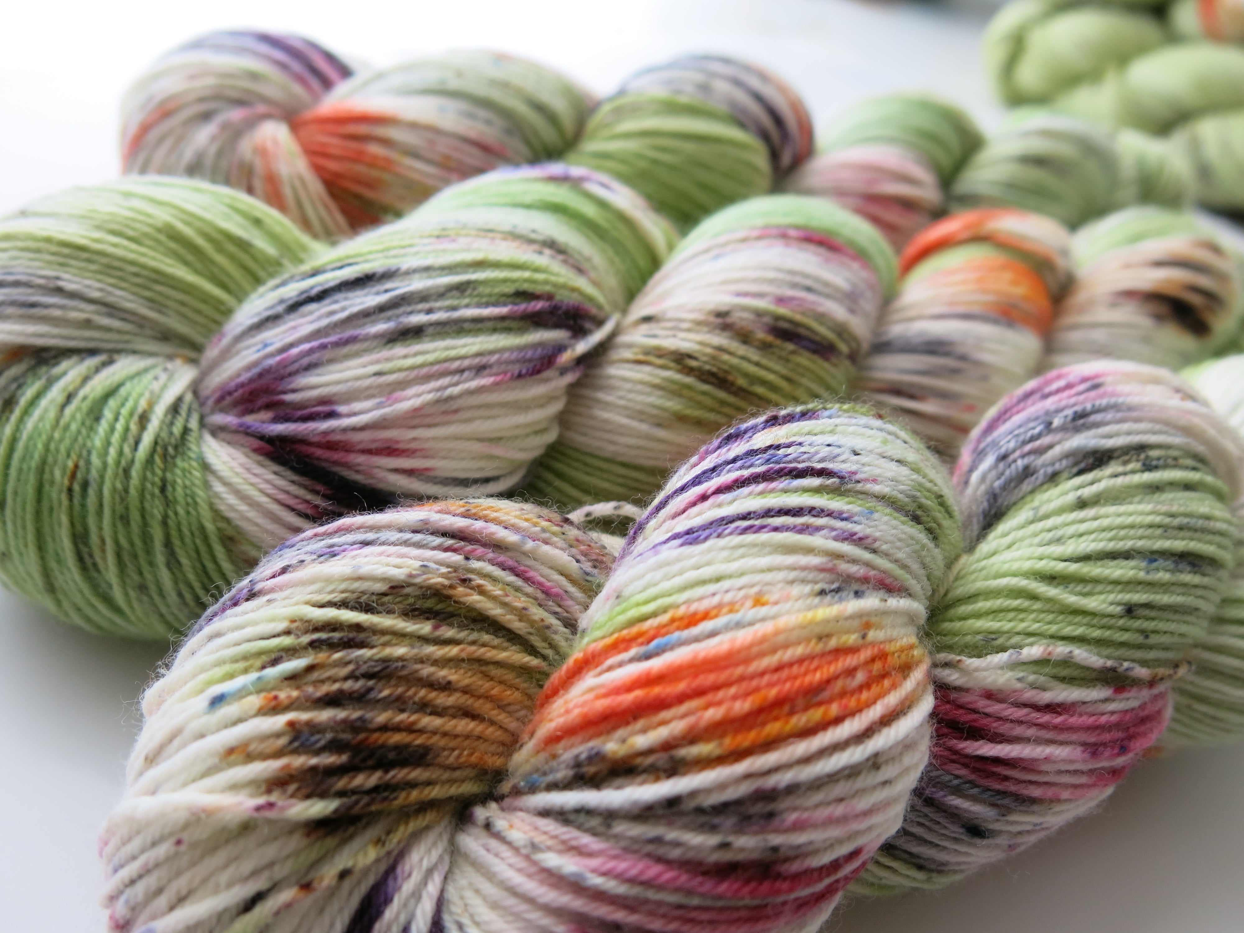 hand dyed merino with nylon sock yarn skeins with speckles