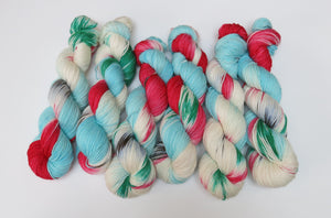 indie dyed christmas themed merino dk yarn skeins