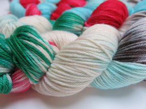 hand dyed christmas themed merino dk yarn skeins