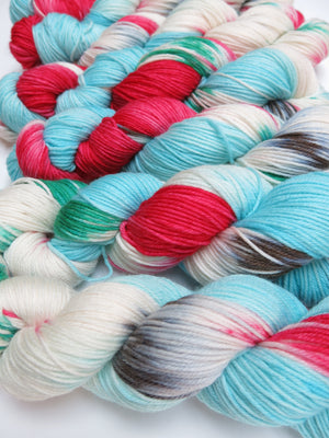 hand dyed christmas themed merino dk yarn skeins