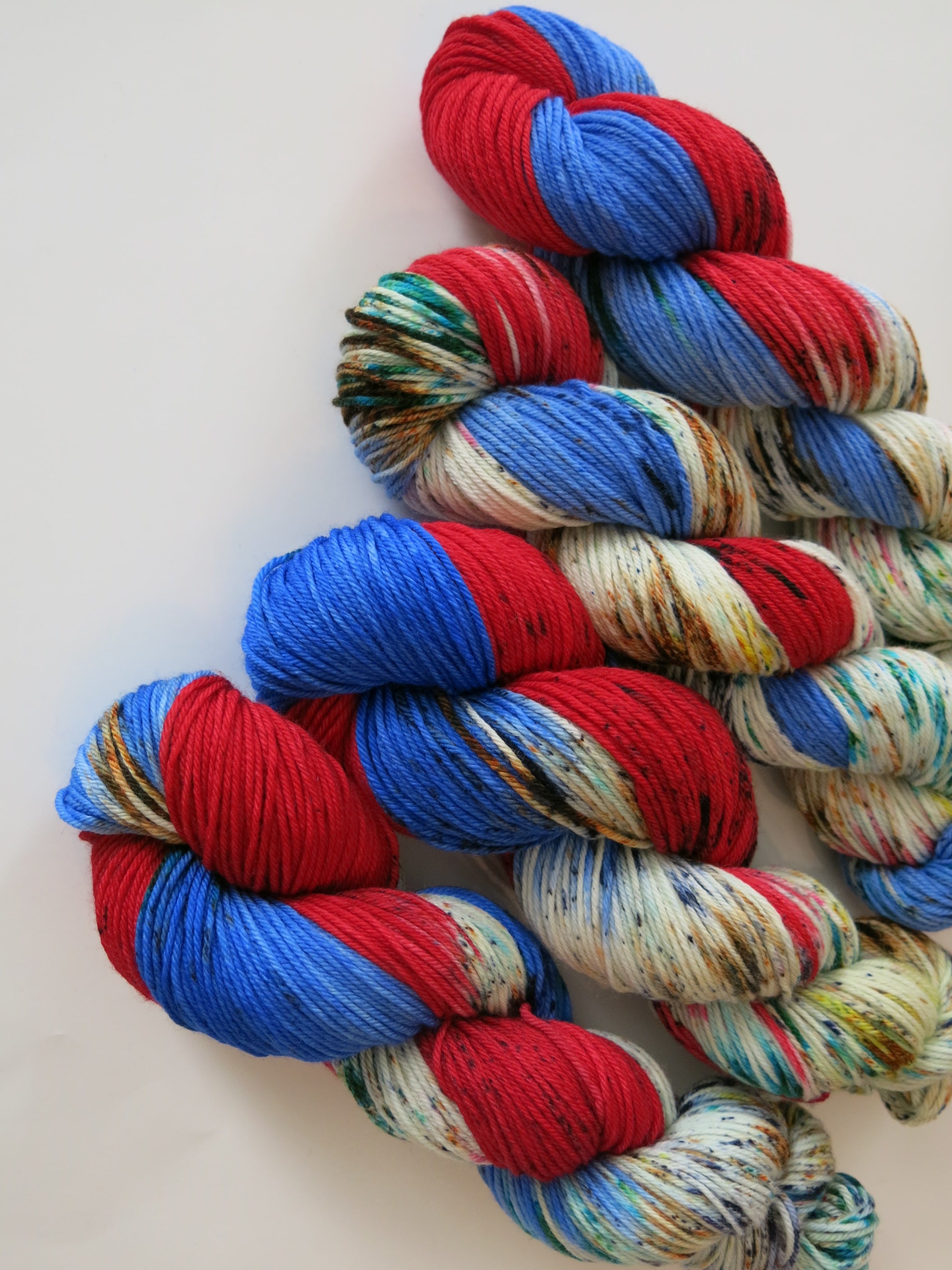 fear and loathing inspired speckled yarn skeins