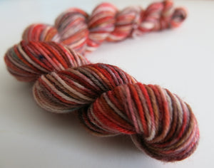 hand dyed red speckled sock yarn mini skein