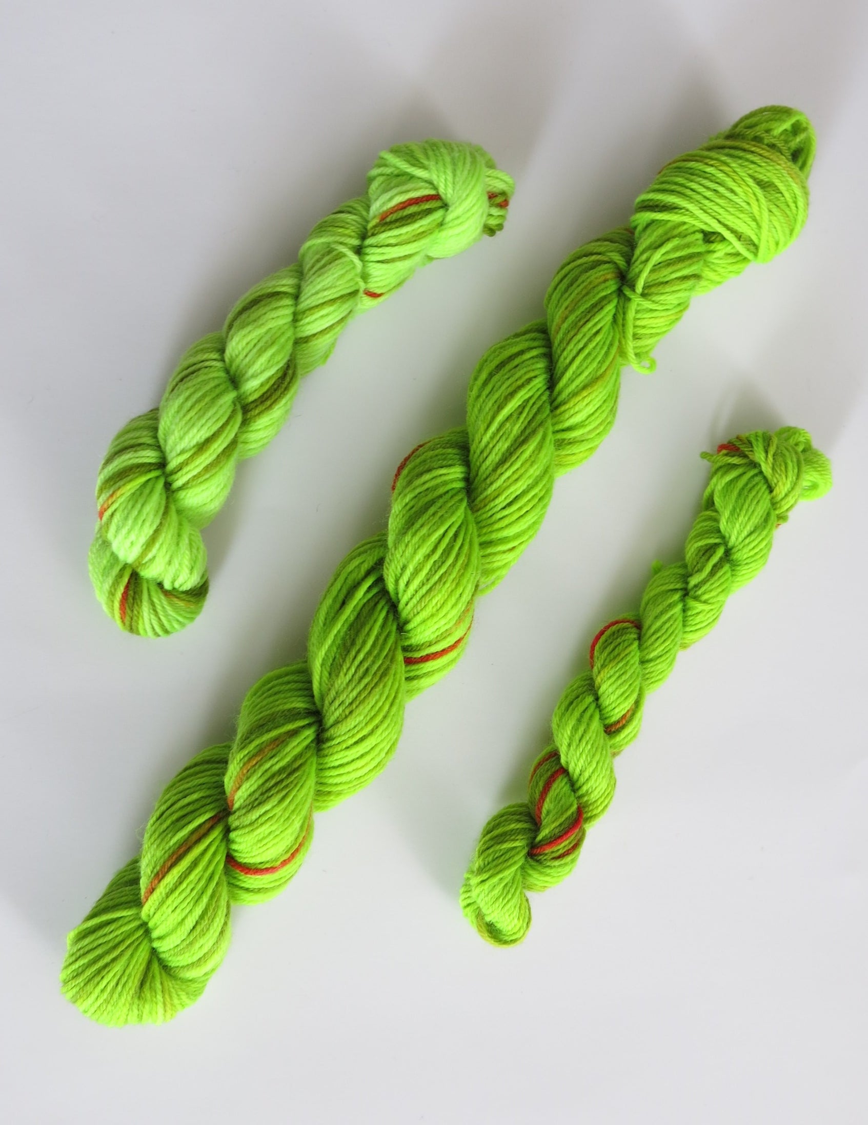hand dyed uv reactive green christmas sock yarn