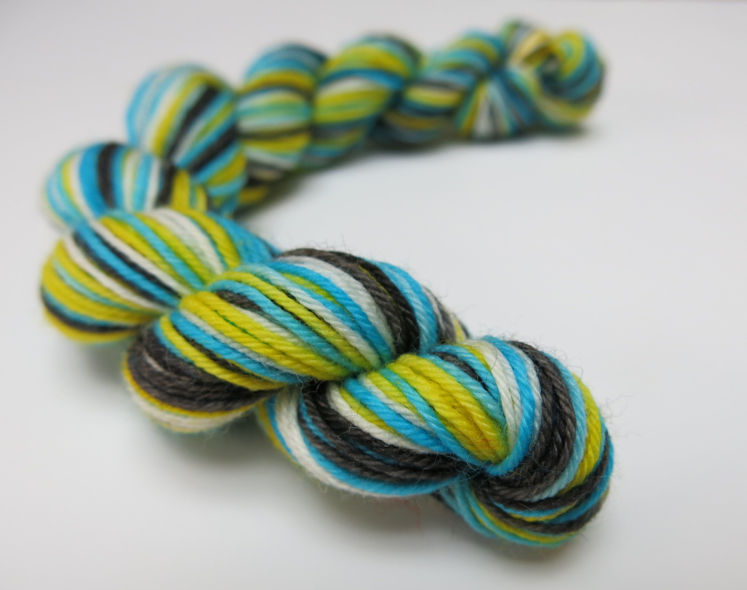 hand dyed alice in wonderland sock yarn