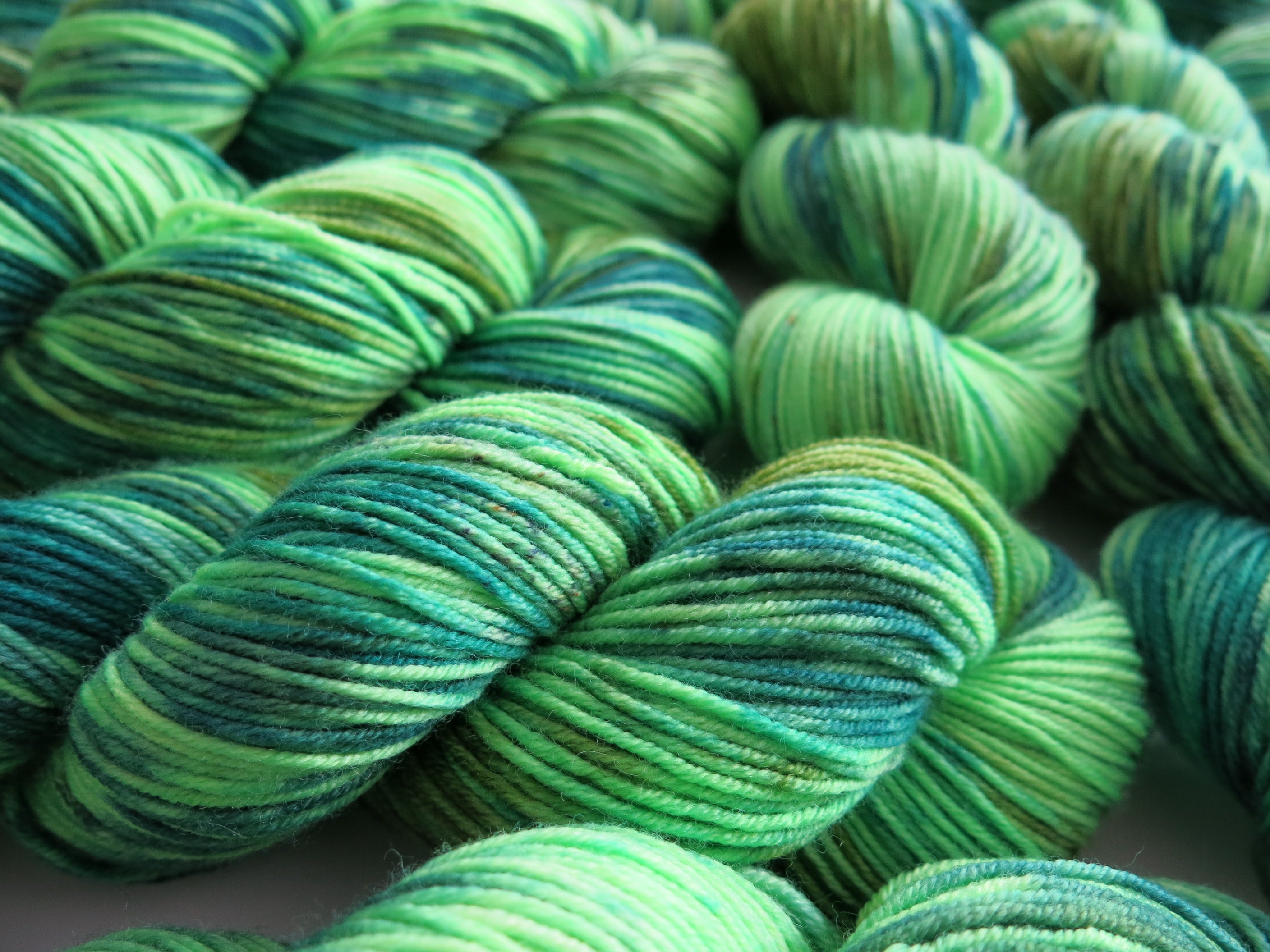 patsy mermaid green 8 ply superwash merino dk yarn skeins