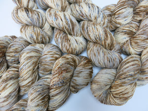 brown speckled hand dyed yarn with a scottish theme