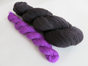 hand dyed sock yarn set with black and uv responsive purple
