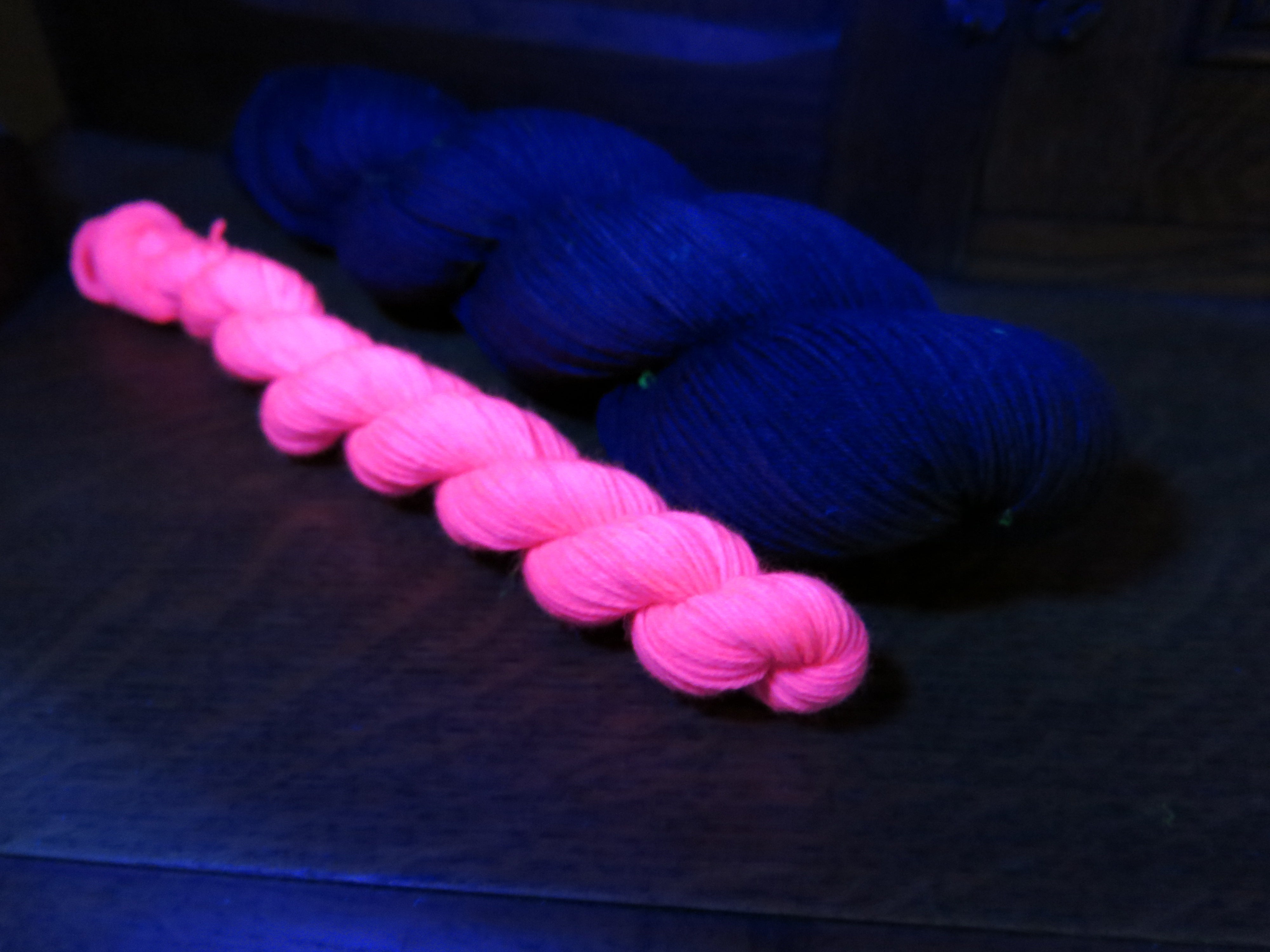 indie dyed black light responsive sock yarn skein