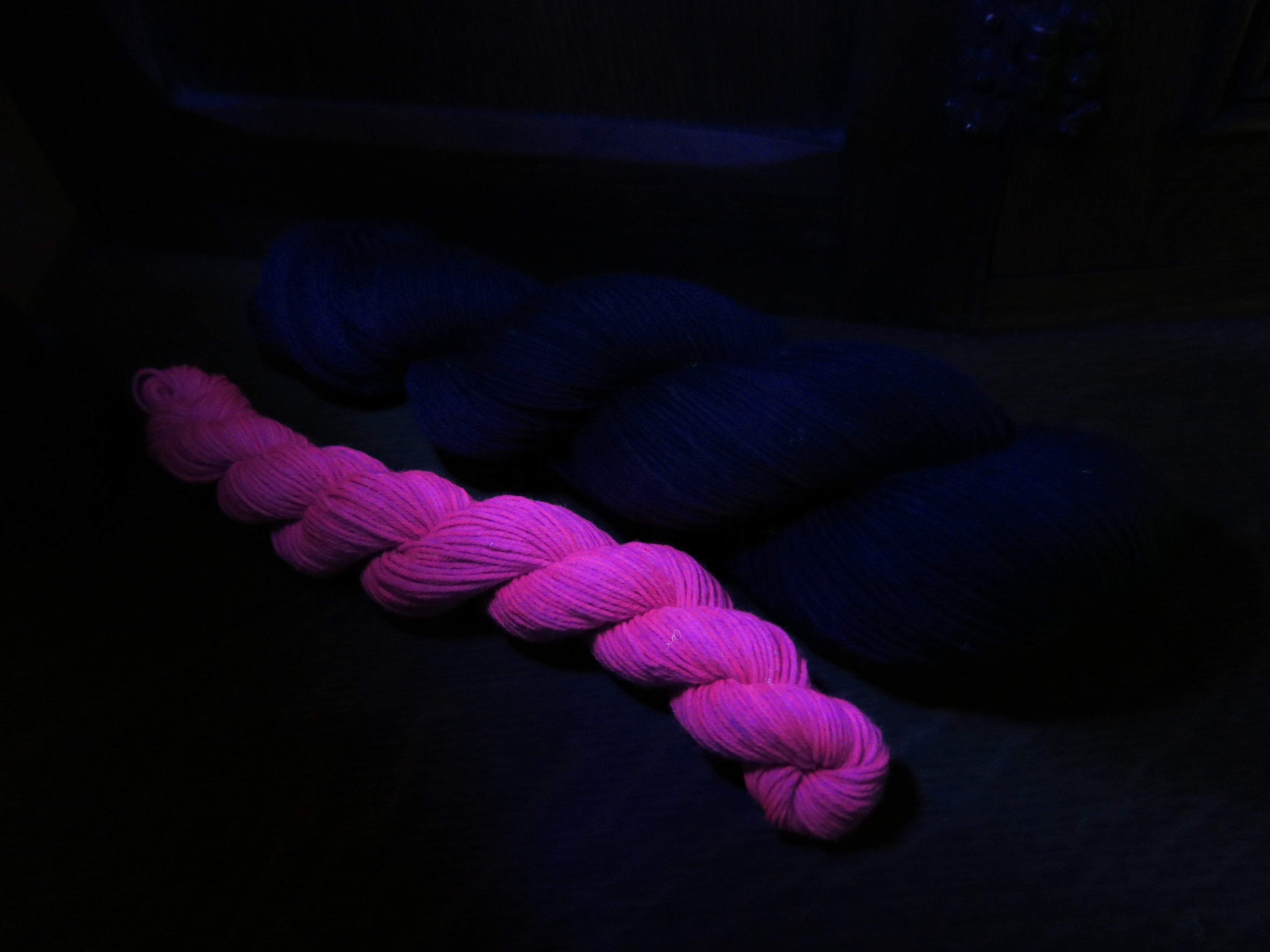 indie dyed black light responsive purple sock yarn skein