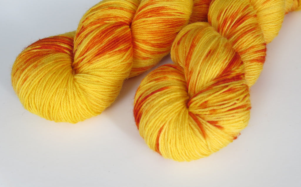 hand dyed yarn with golden yellow and orange