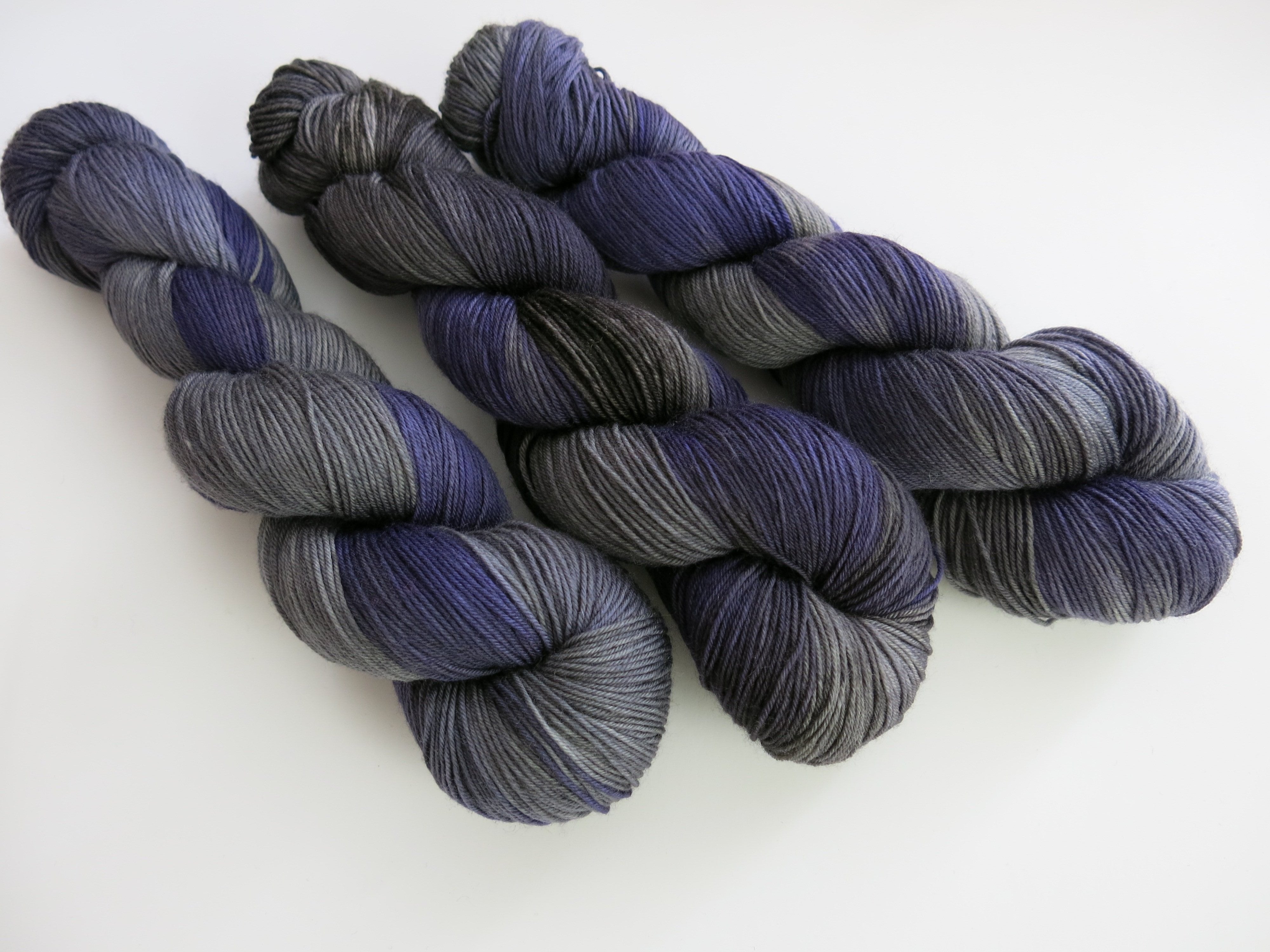 superwash merino sock yarn for knitting and crochet in grey and purple