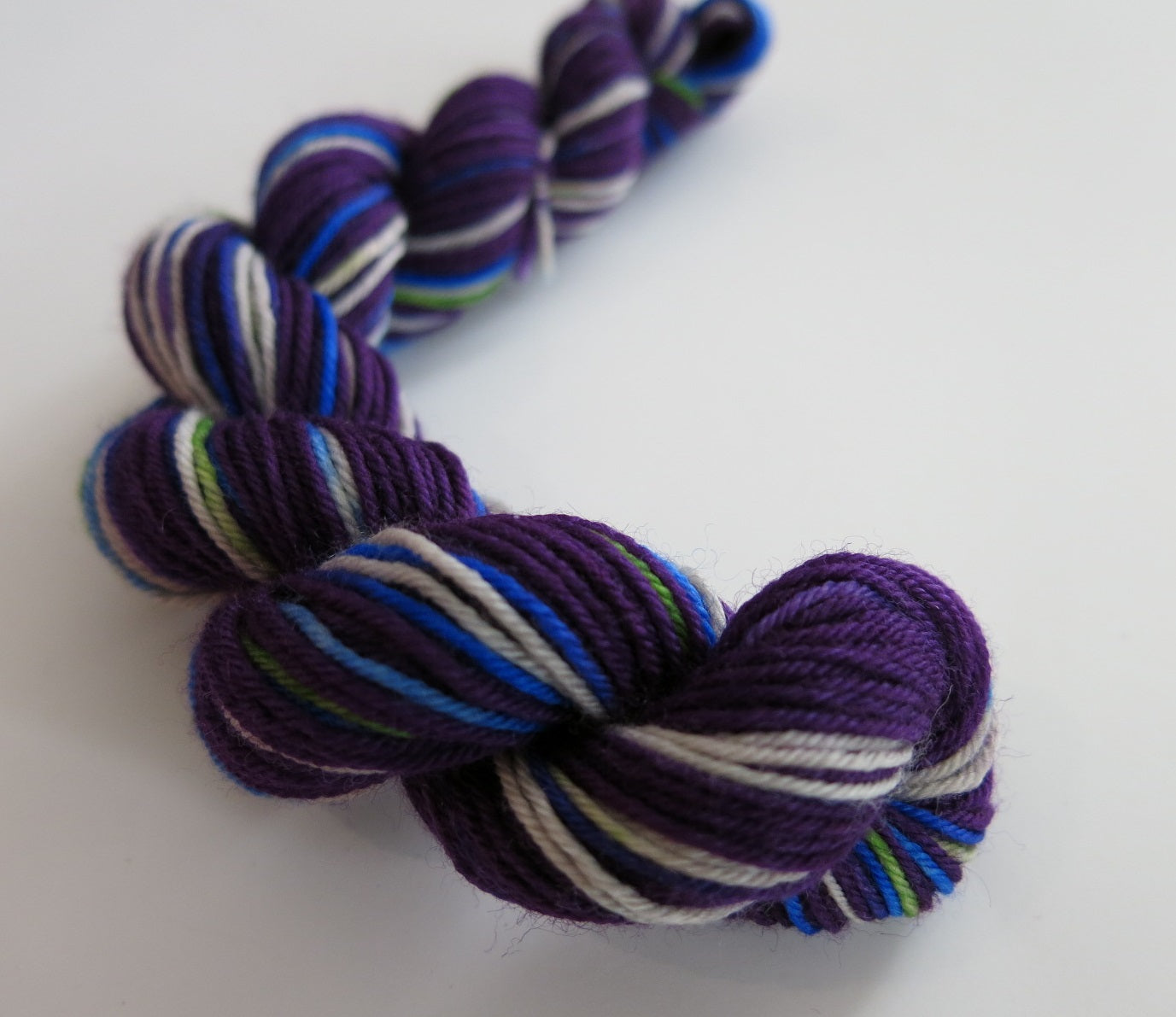 20g mini skeins hand dyed by my mama knits in purple