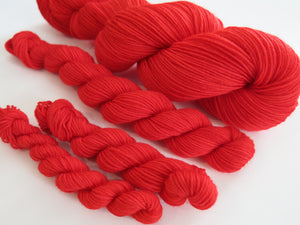 indie dyed red merino yarn skein by my mama knits