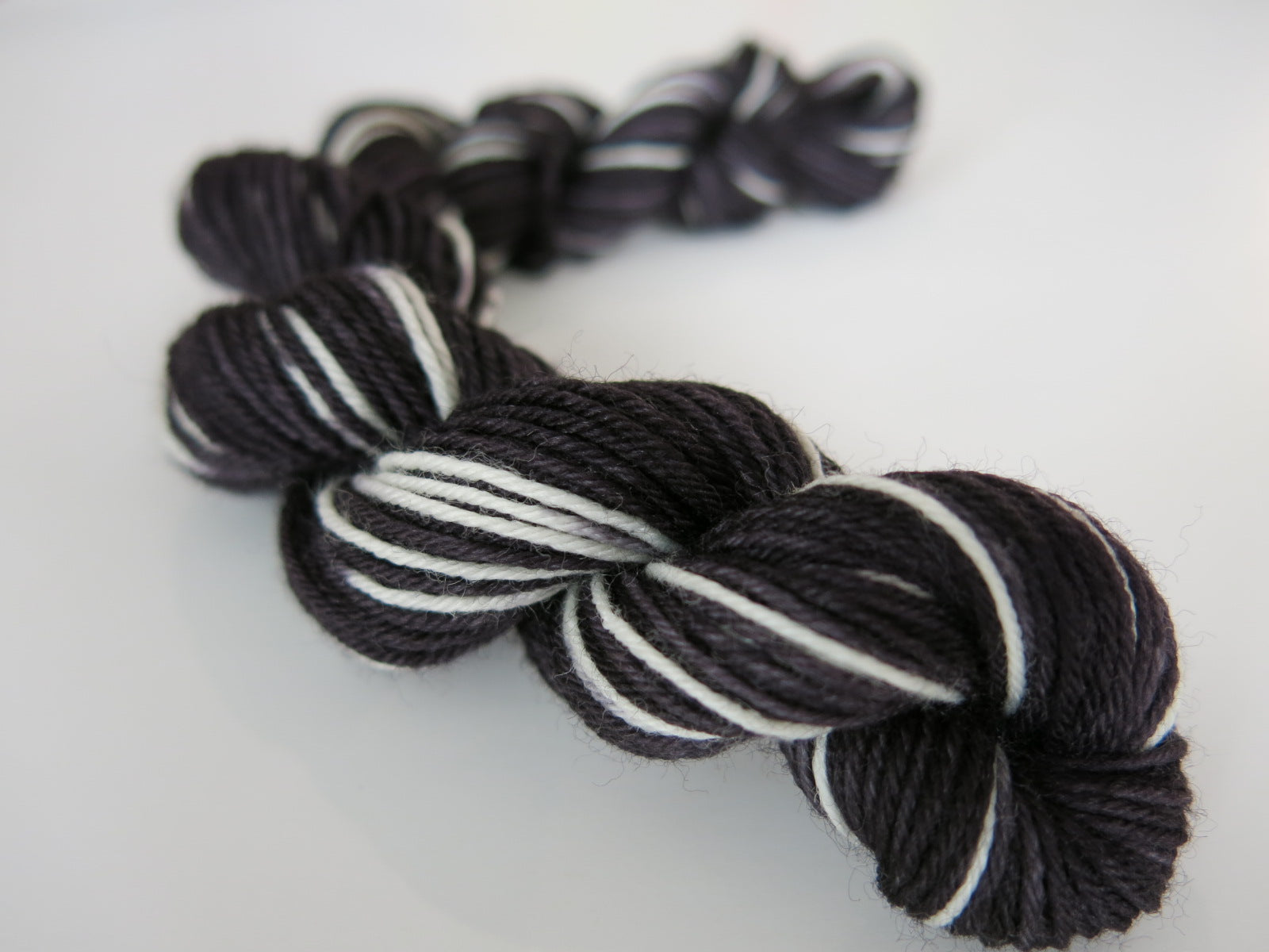 hand dyed black and white scottish cat inspired sock yarn