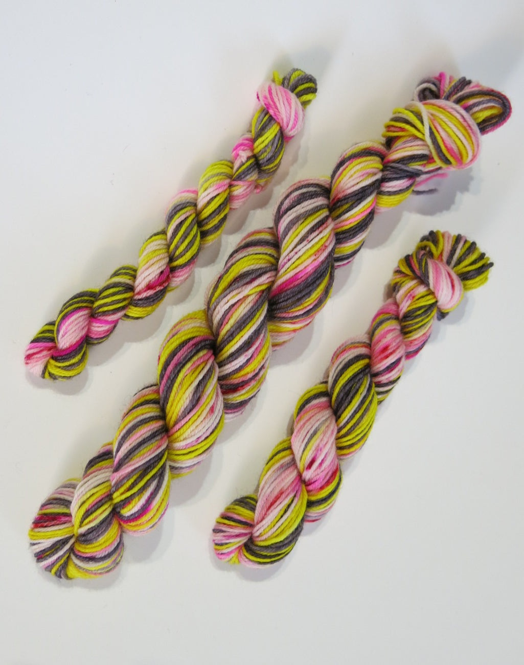 indie dyed mini skeins in yellow, black and pink