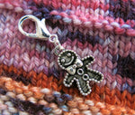 hanging gingerbread man charm with a lobster clasp