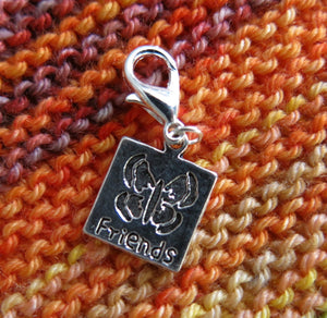 friendship charm with a butterfly for bracelets, bags and knitting