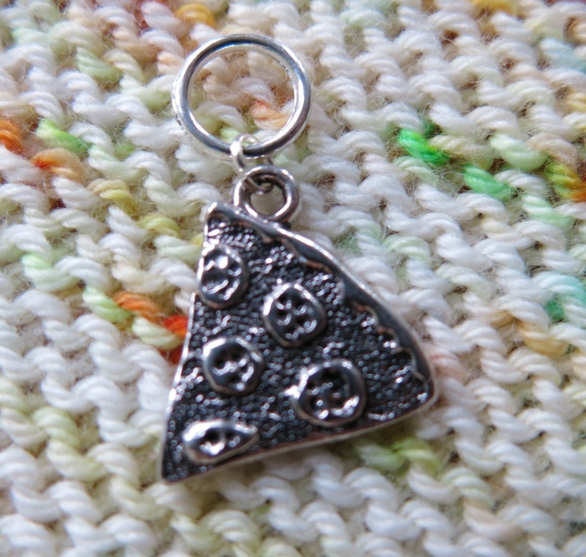 silver pizza slice stitch marker for knitting projects