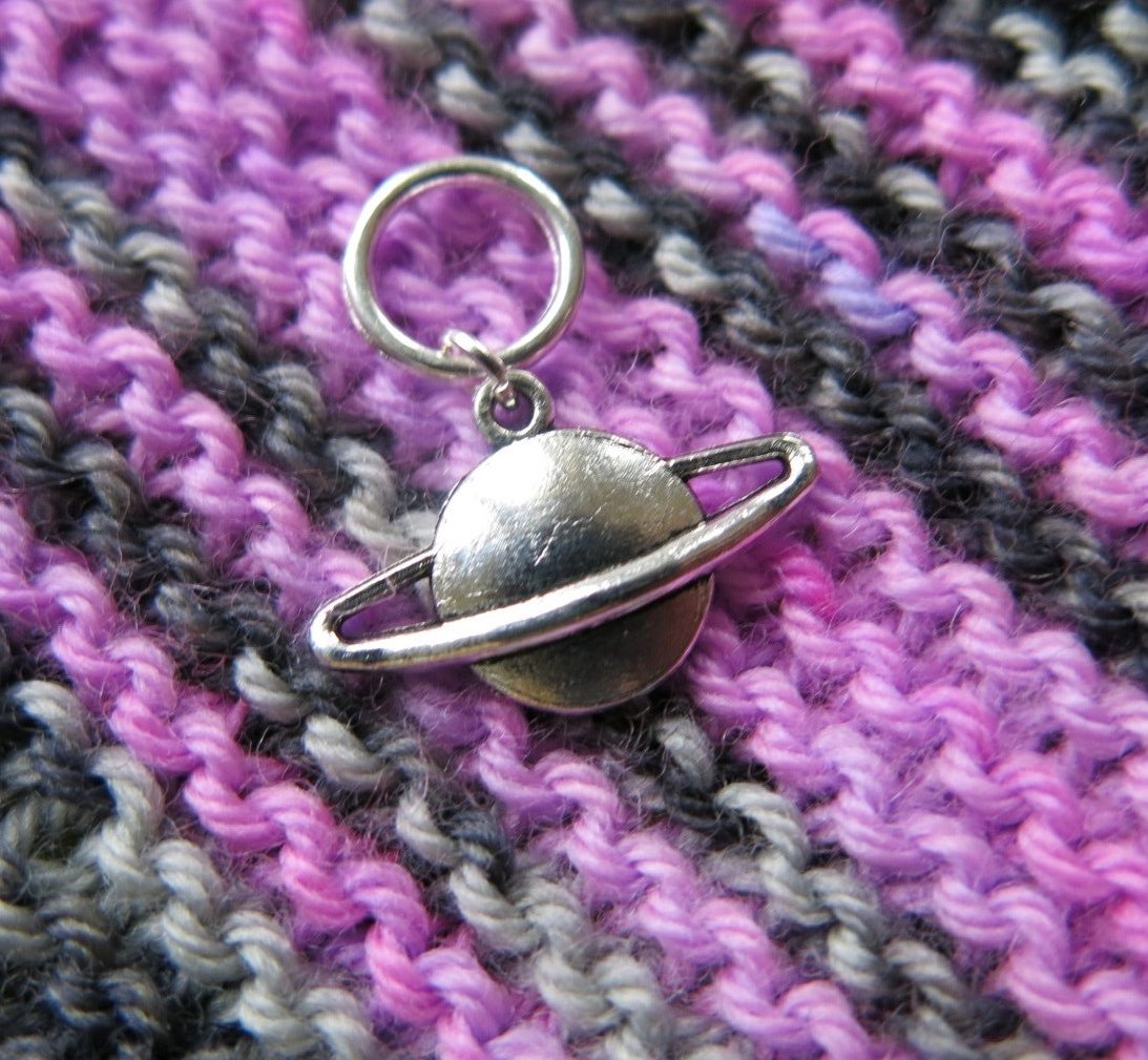 silver planet charm on a snagless jump ring for knitting