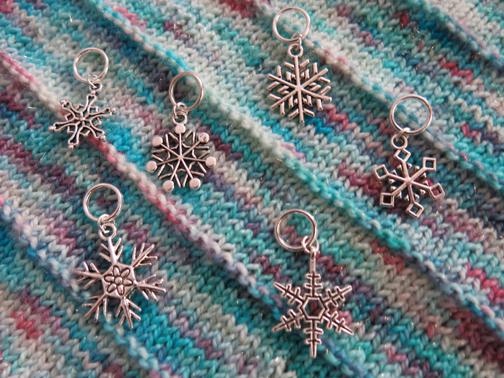 silver snowflake stitch marker set on snagless jumprings for knitting