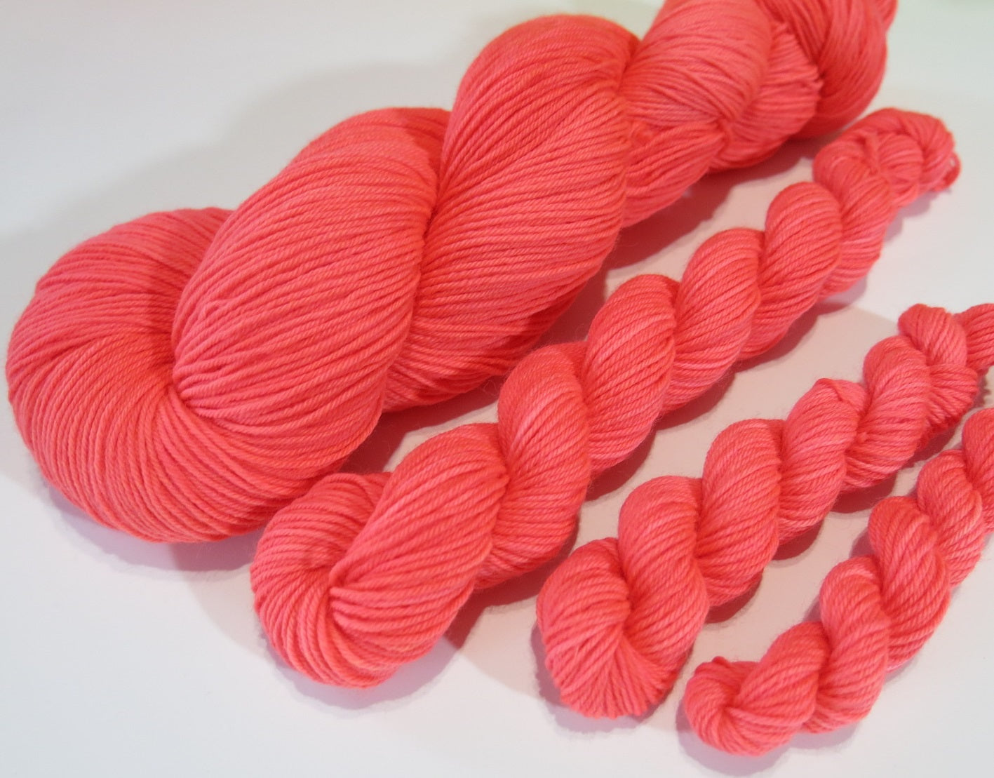indie dyed uv reactive orange sock yarn for knitting and crochet