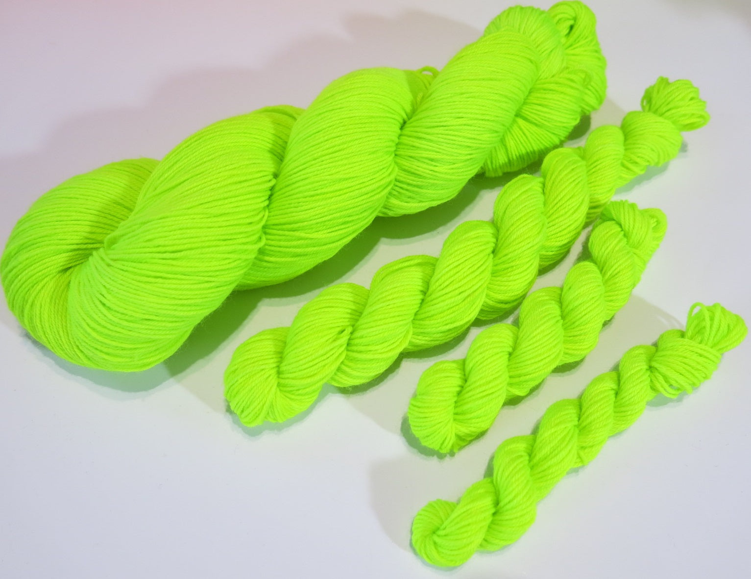 fluorescent yellow green uv reactive yarn by my mama knits