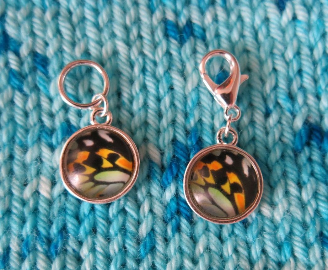 blue yellow and black butterfly wing stitch markers for knitting and crochet