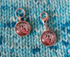 white and pastel pink butterfly wing stitch markers for knitting and crochet