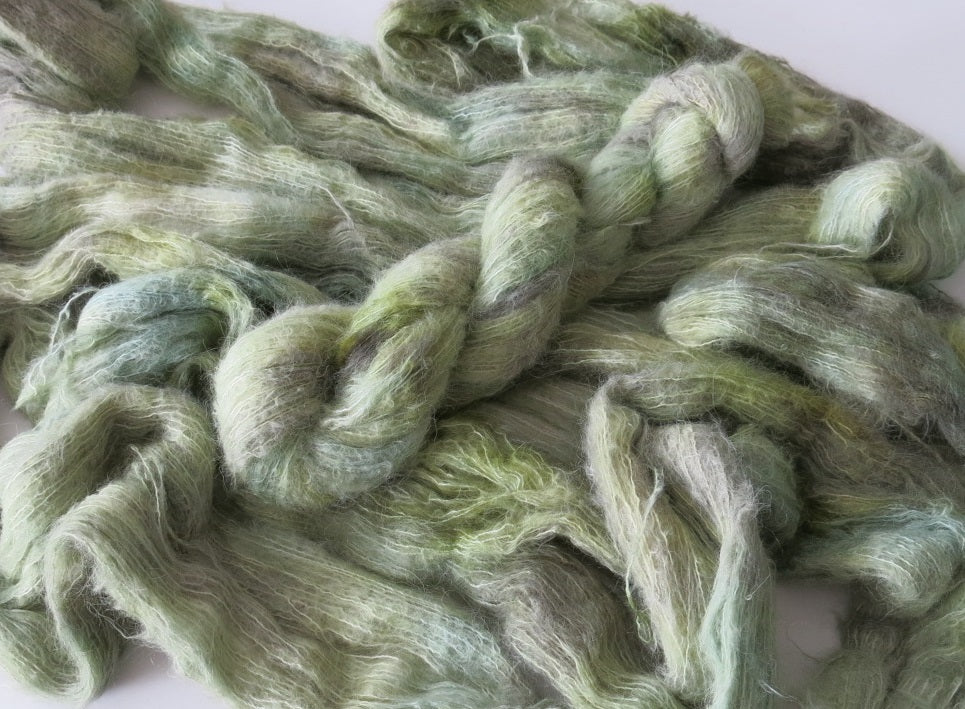 green as glass alpaca yarn skein on fluff lace by my mama knits