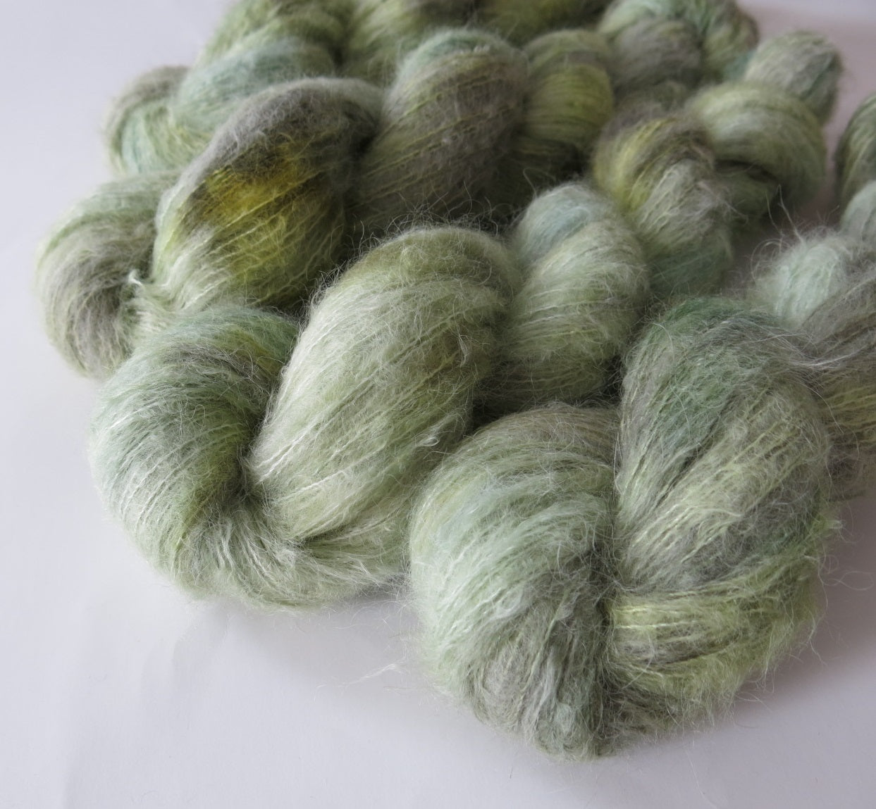 green glass indie dyed lace weight alpaca and silk yarn for knitting weaving and crochet