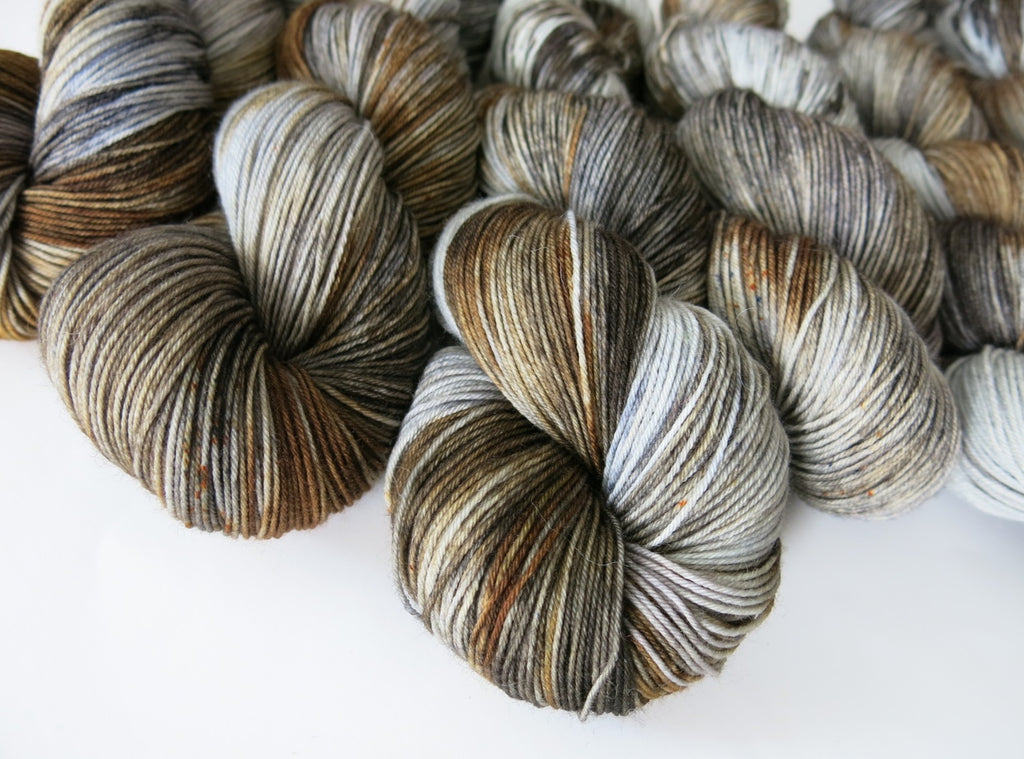 hand dyed selkie coat grey and brown merino sock yarn
