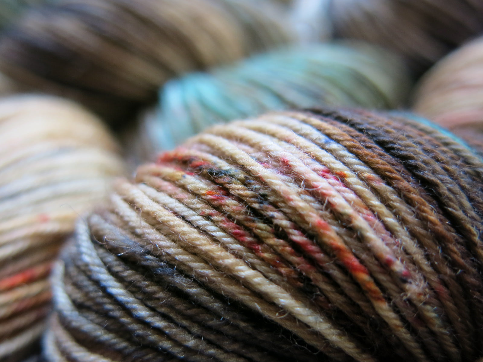 hand dyed brown and blue merino sock yarn for knitting and crochet