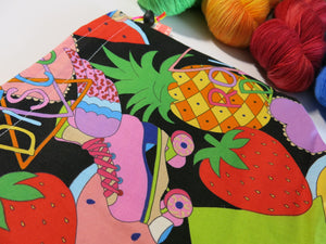 colourful cotton knitting project bag with rollerskates and pineapples