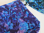 cotton drawstring knitting project bag with a batik bird and flower print in purple and blue