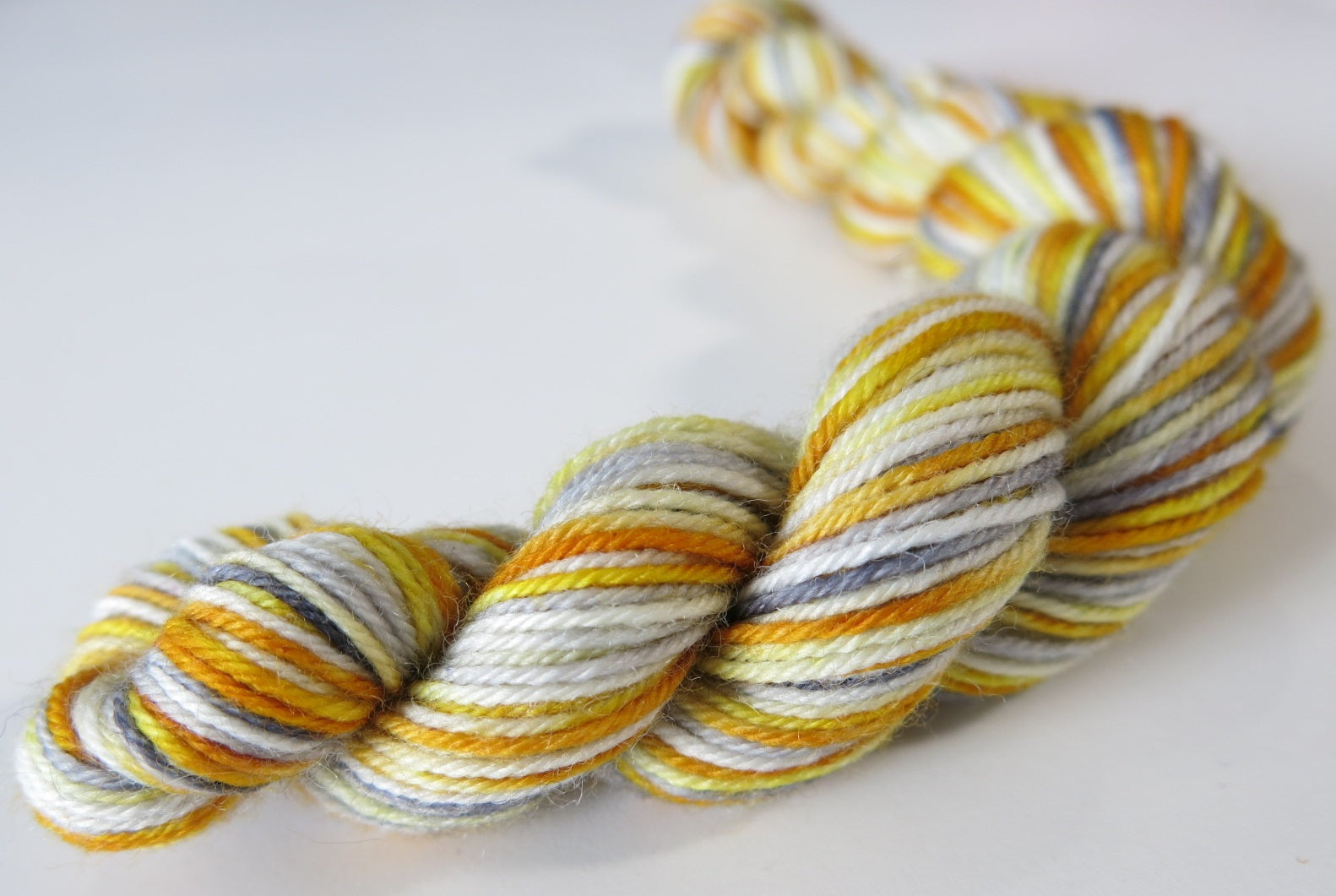golden yellow grey and white merino sock yarn mini skeins