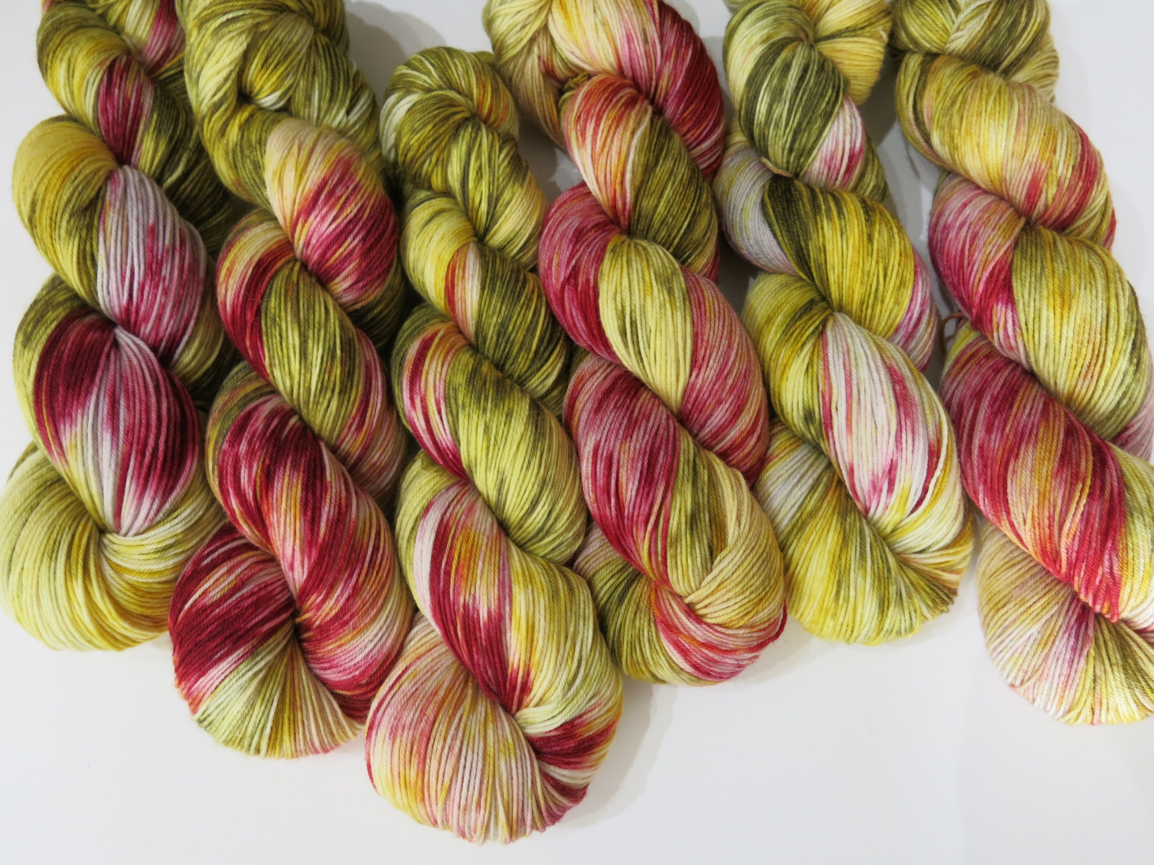 hand dyed maroon red and green wool inspired by trout
