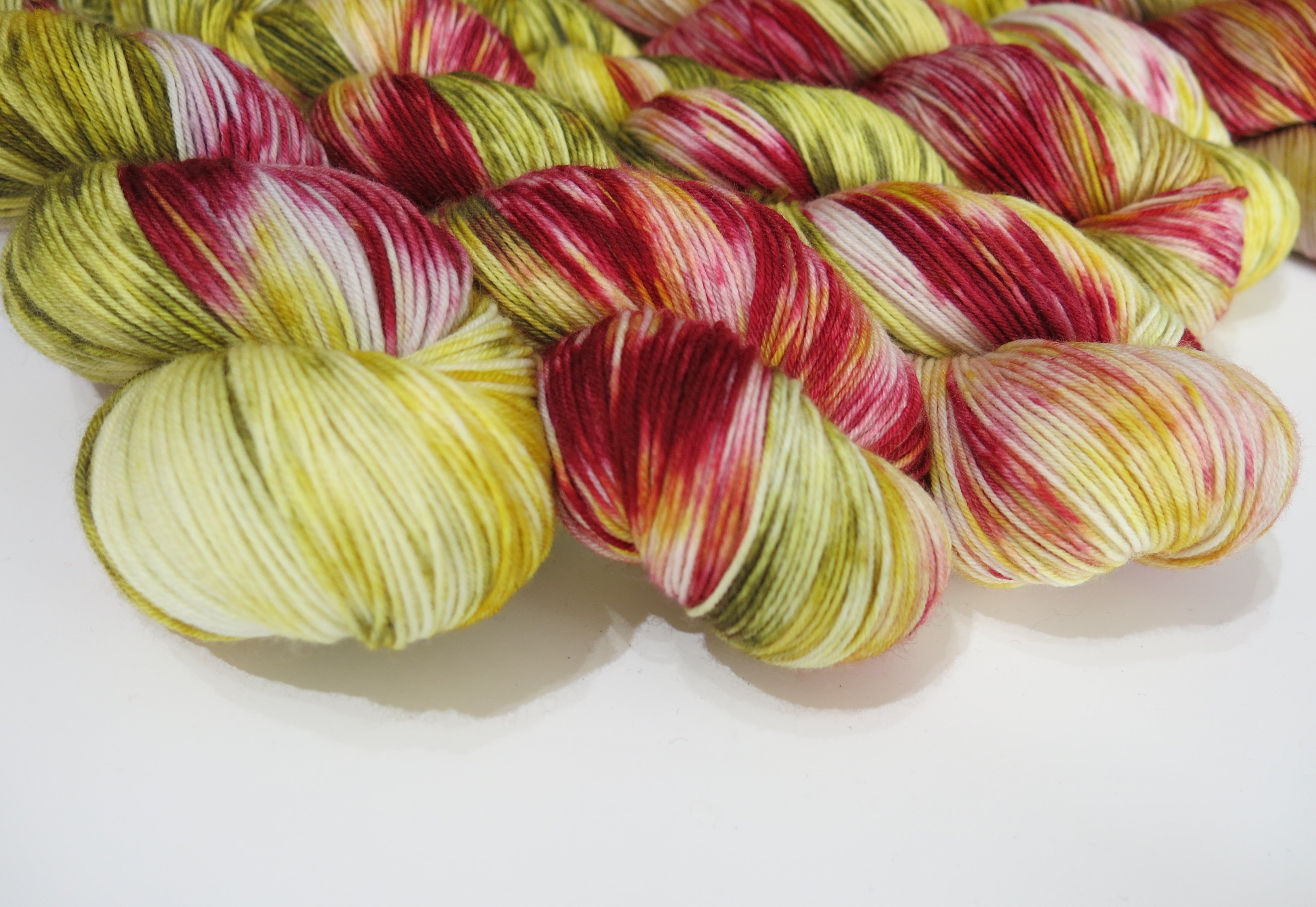 hand dyed maroon red and green sock yarn skiens inspired by trout
