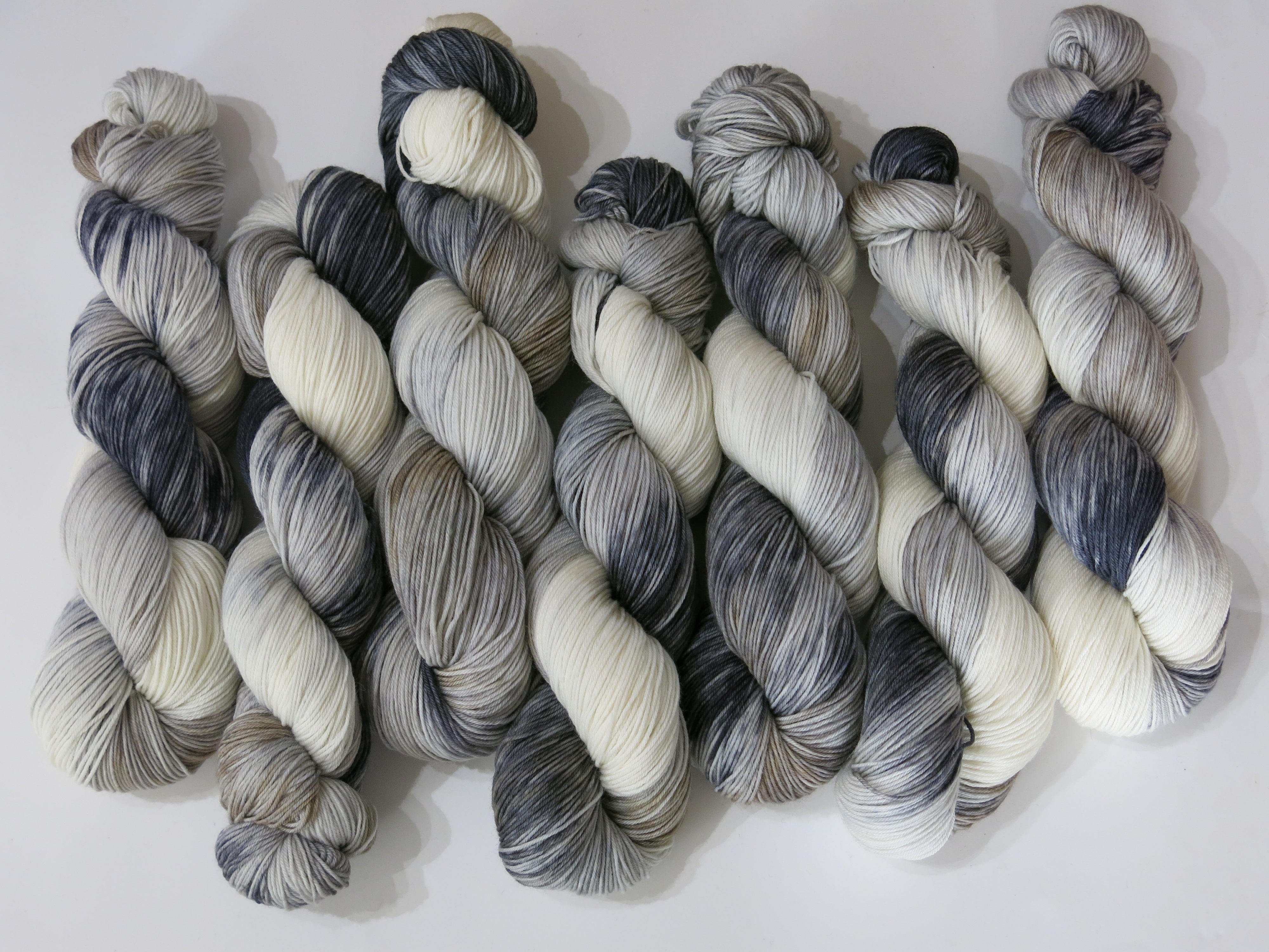 light and dark grey and white horse themed sock yarn for knitting and crochet