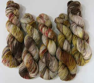 the great hand hand dyed yarn by my mama knits in speckled browns 