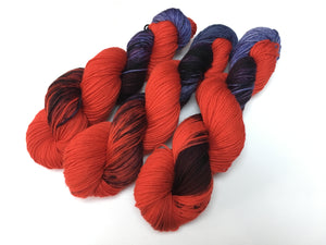 indied yed red and purple sock yarn skeins for knitting and crochet