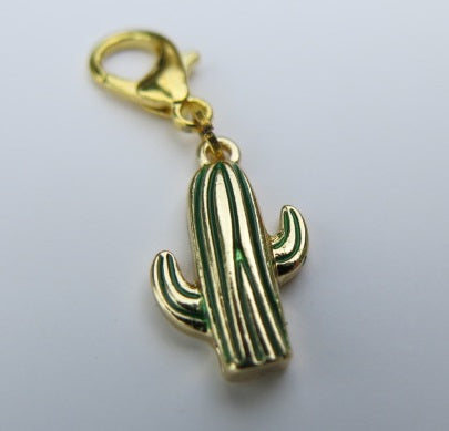 gold coloured cactus stich marker on a lobster clasp with green painted detail