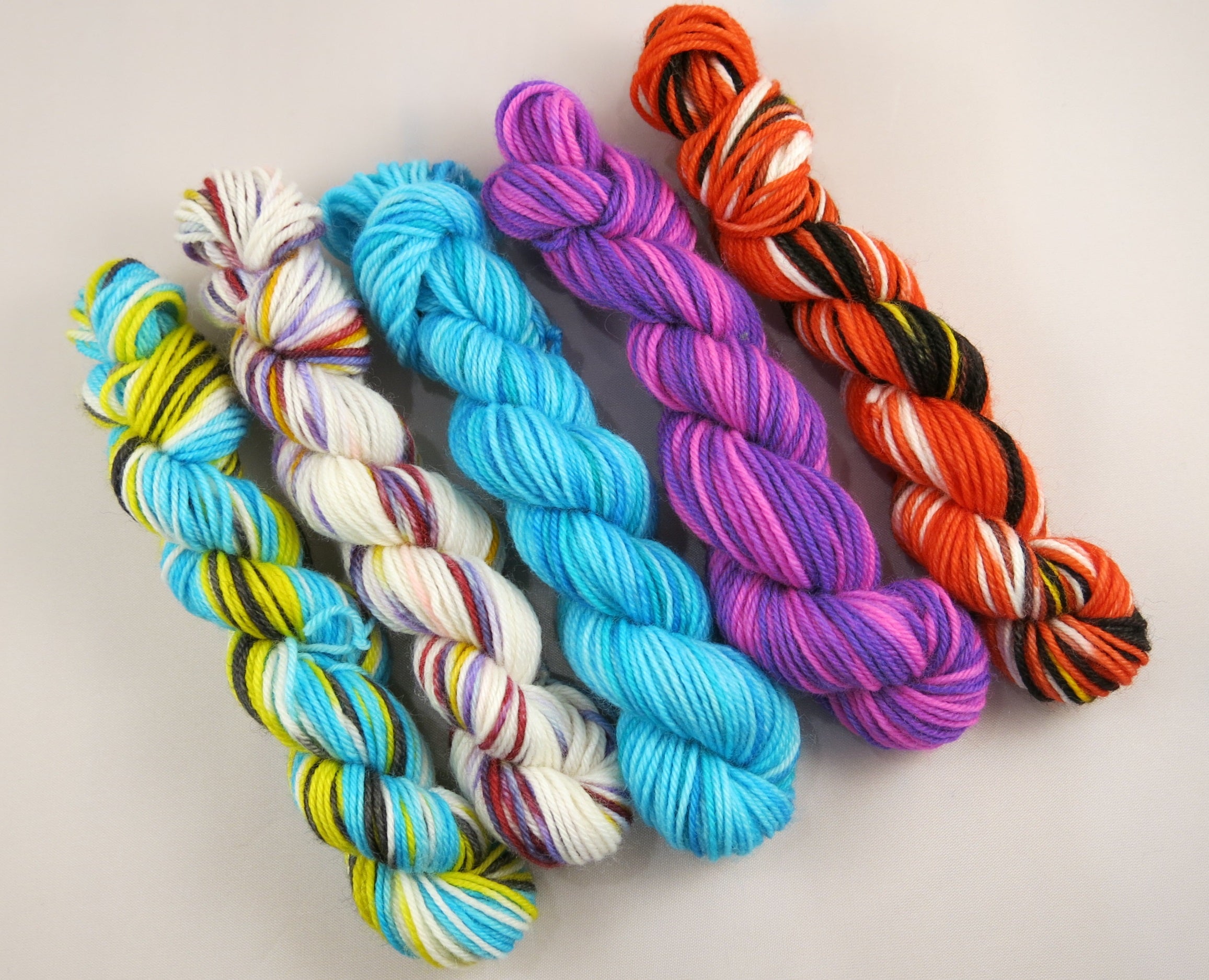 hand dyed alice in wonderland inspired merino sock yarn
