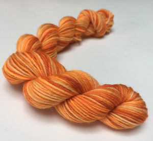 20g hand dyed orange superwash merino with nylon sock yarn miniskein