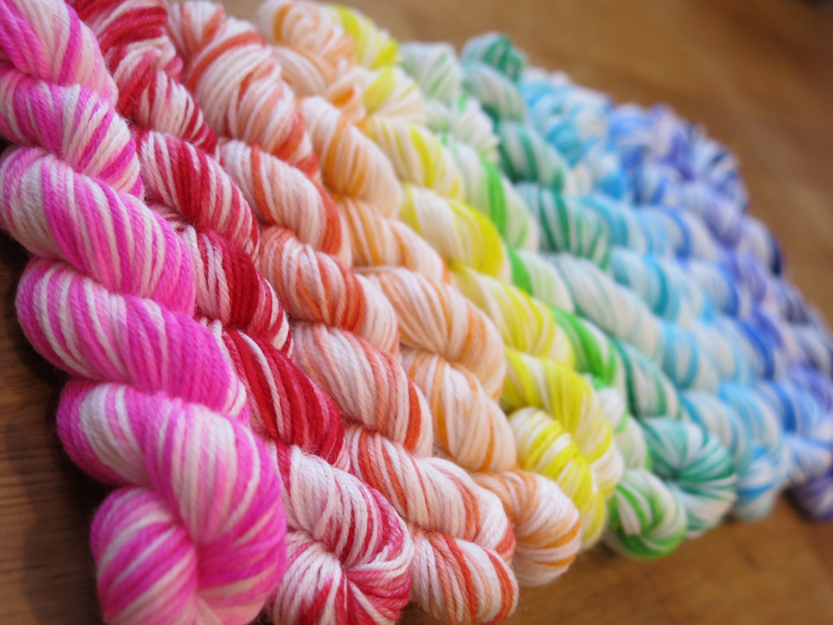 hand dyed vivid rainbow mini skeins on choufunga sock yarn