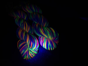 sugar skull yarn glowing under uv black light