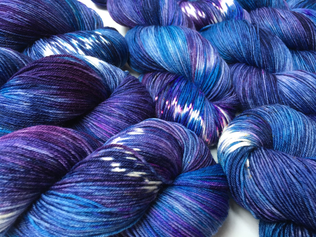 hand dyed outerspace themed sock yarn for knitting and crochet