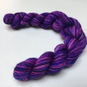 uv reactive purple space themed yarn mini skein